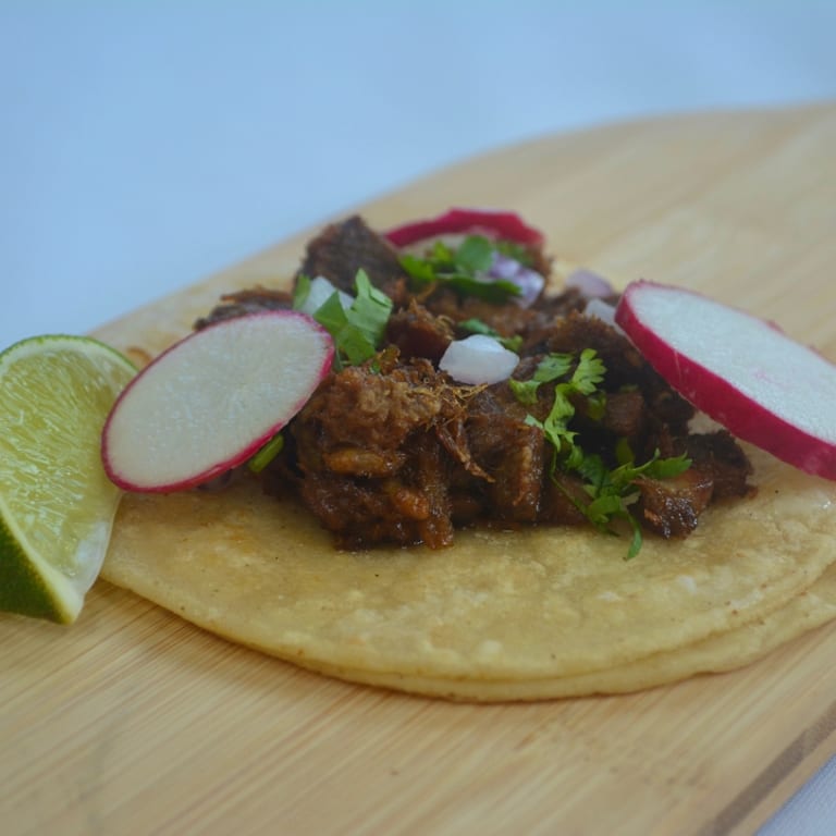 Indulge in Lengua Tacos